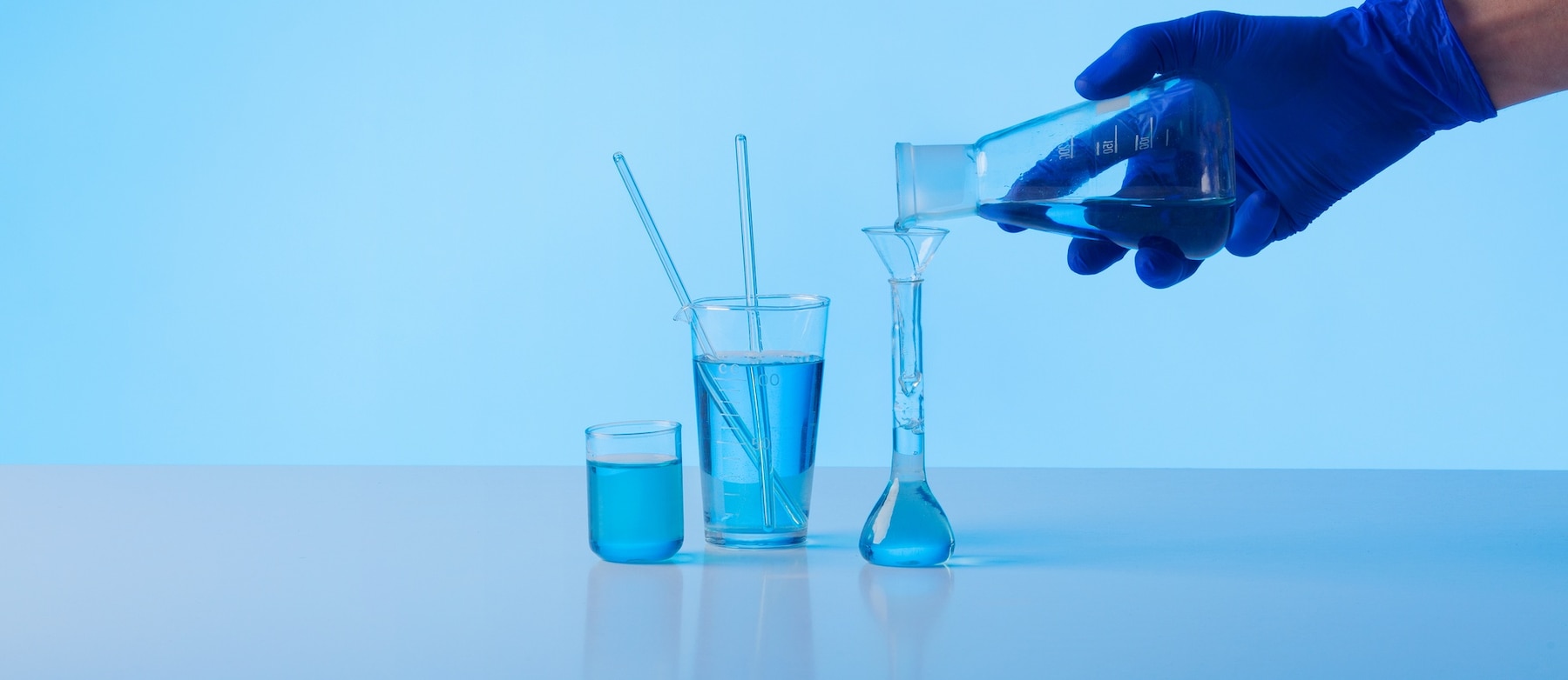 scientist-pouring-substance-side-view_23-2149731481.jpg