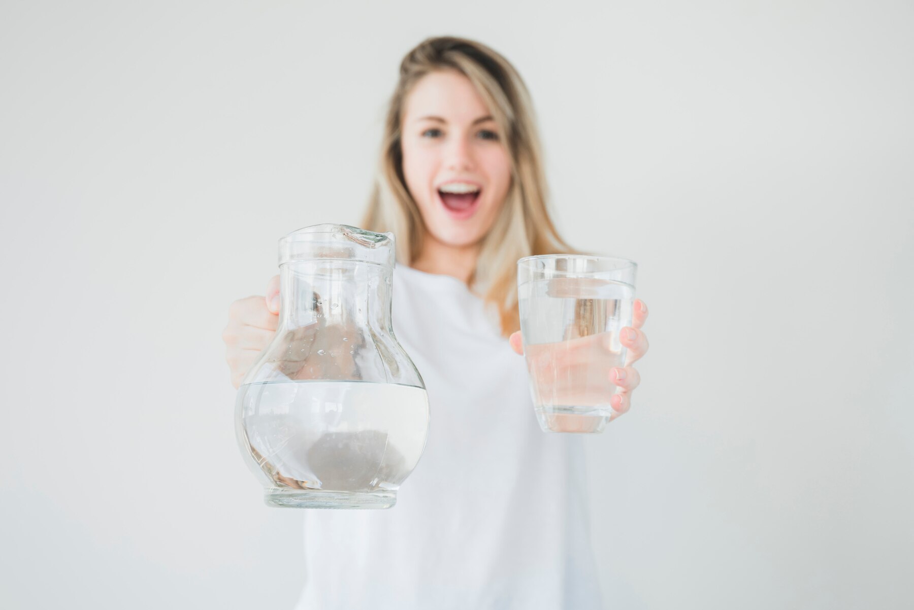 blonde-girl-holding-jar-and-glass-of-water_23-2148113497.jpg