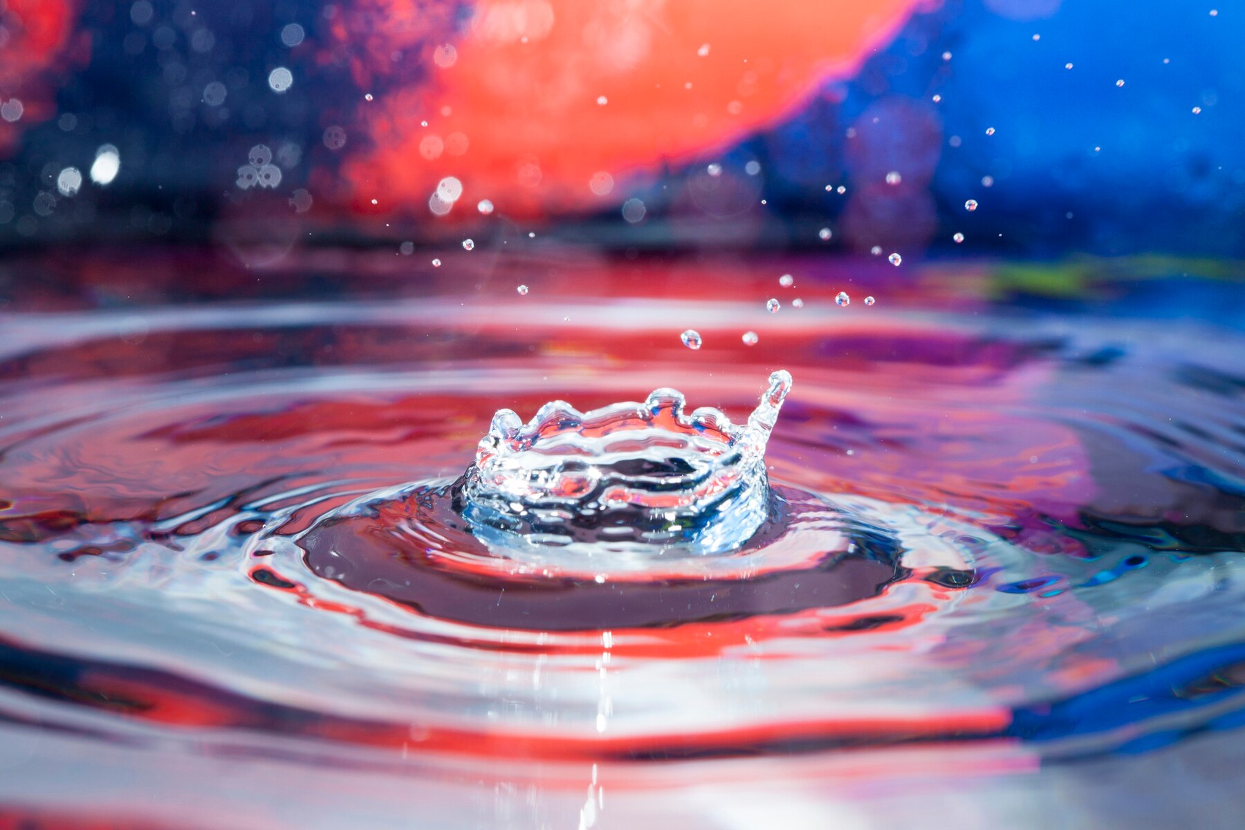 water-surface-with-splashes-and-colorful-background_23-2147608486.jpg